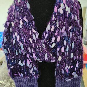 Knitted scarf with top bubbles yarn, s and light. 72 in long x6in wide.